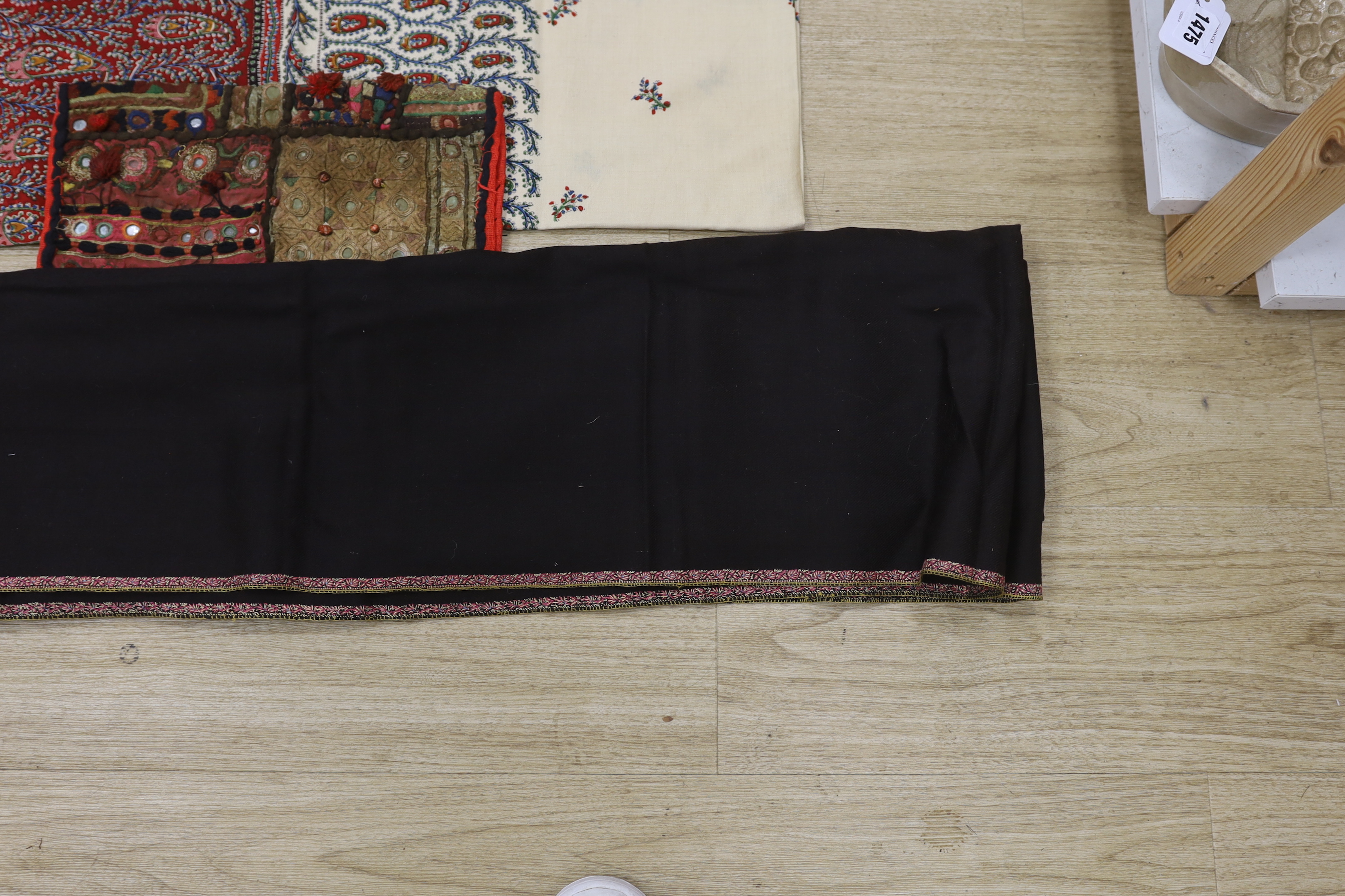 A 19th century Indian mirrored square, a printed summer paisley shawl and a black wool and embroidered stole, summer shawl 156cm square